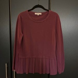 Burgundy Loft top, pleated detail at bottom. Banded at wrist for slight ruffle